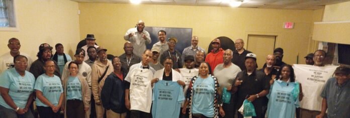 Dr. Cynthia Jones surrounded by prostate cancer survivors and Black Walnut moviegoers